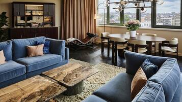 Apartment, 1 King Bed (Separate living area) | Premium bedding, minibar, in-room safe, desk