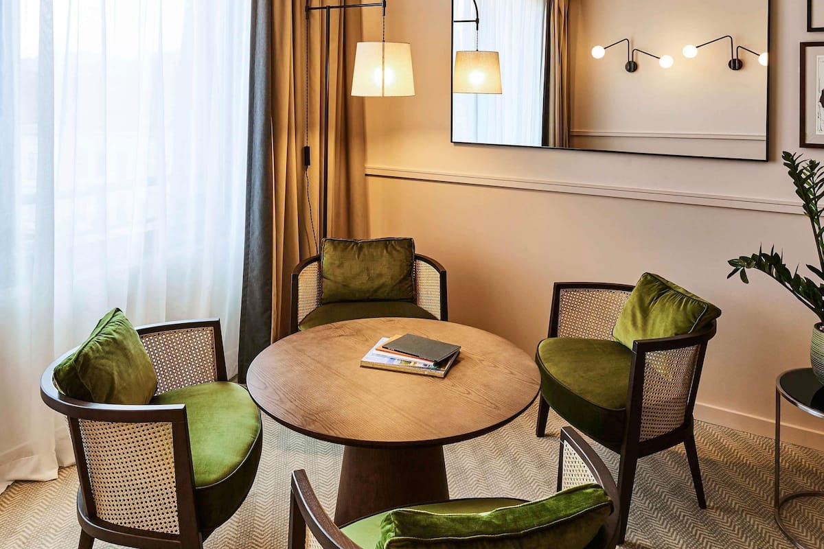 Junior Suite, 1 King Bed (Separate living area) | 1 bedroom, premium bedding, minibar, in-room safe