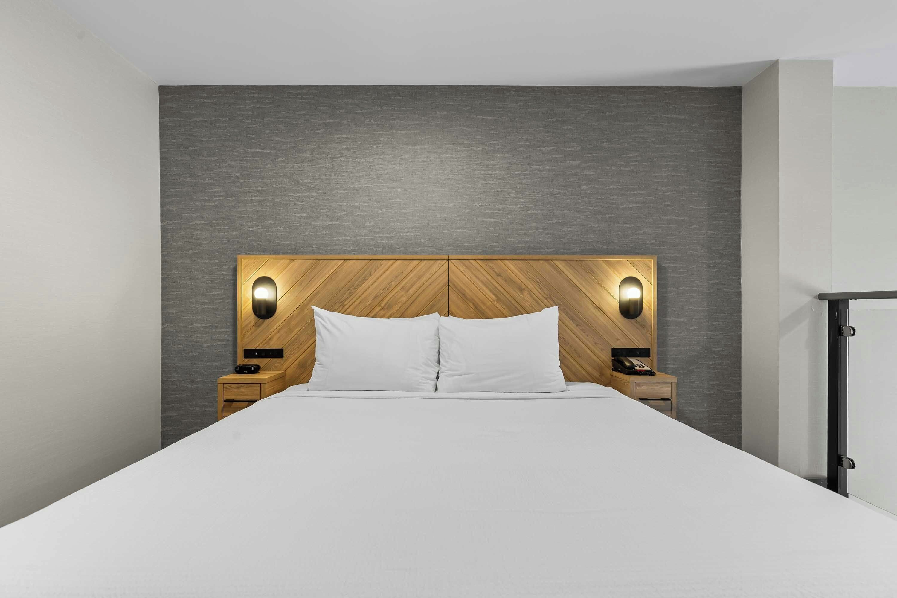 Suite, Kitchenette (Loft. 1 King Bed, Sofa Bed) | In-room safe, desk, laptop workspace, iron/ironing board
