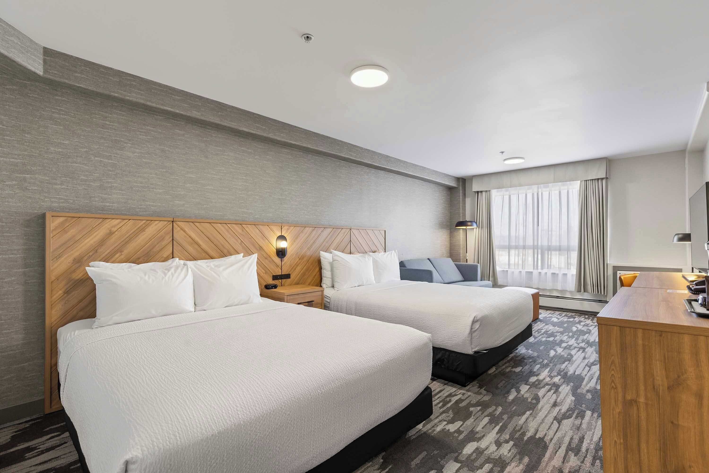 Standard Room (2 Doubles, Sofa Bed) | In-room safe, desk, laptop workspace, iron/ironing board