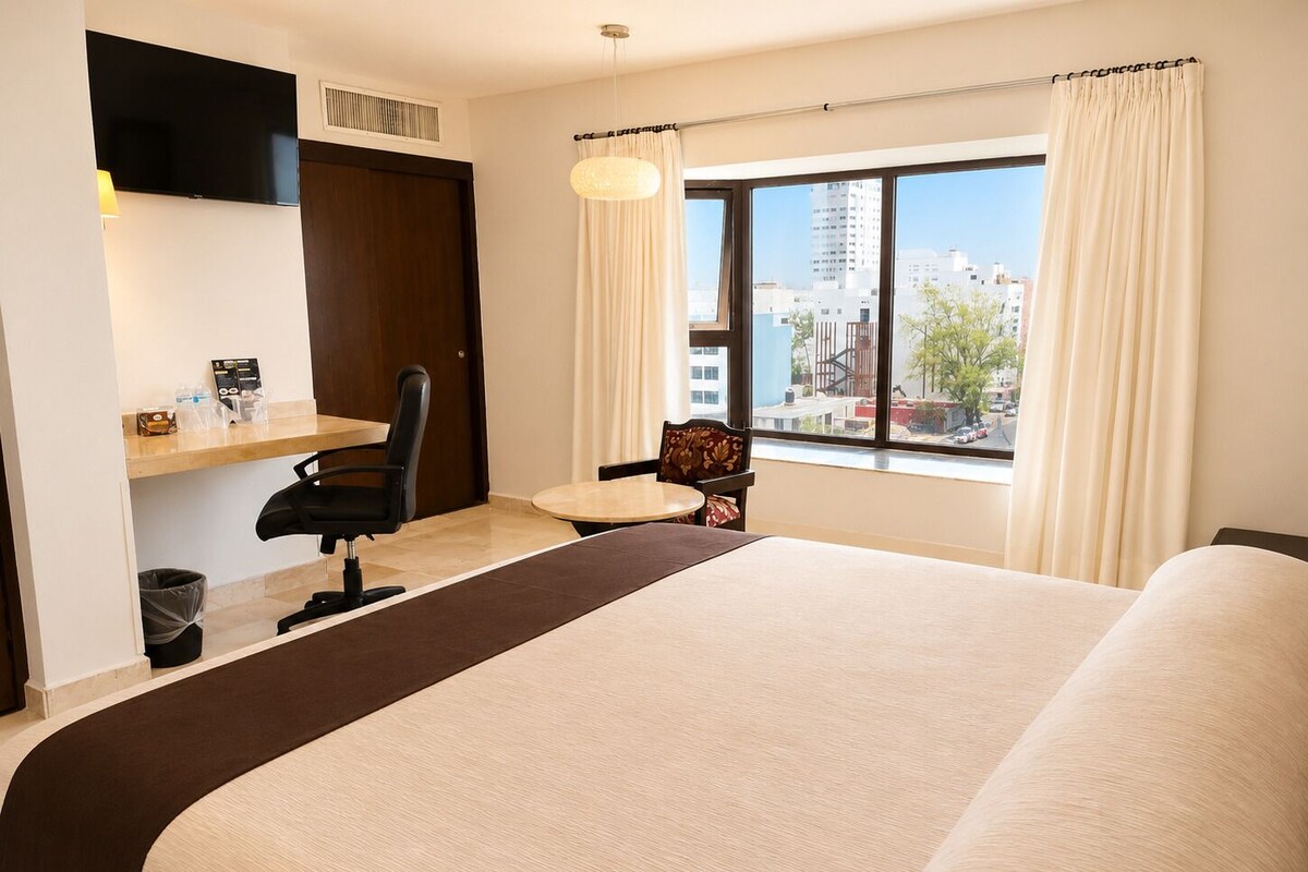 Desk, blackout curtains, iron/ironing board, free WiFi