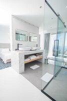 Deluxe Suite, 1 Queen Bed, Non Smoking, Sea View | Bathroom | Free toiletries, hair dryer, bathrobes, slippers
