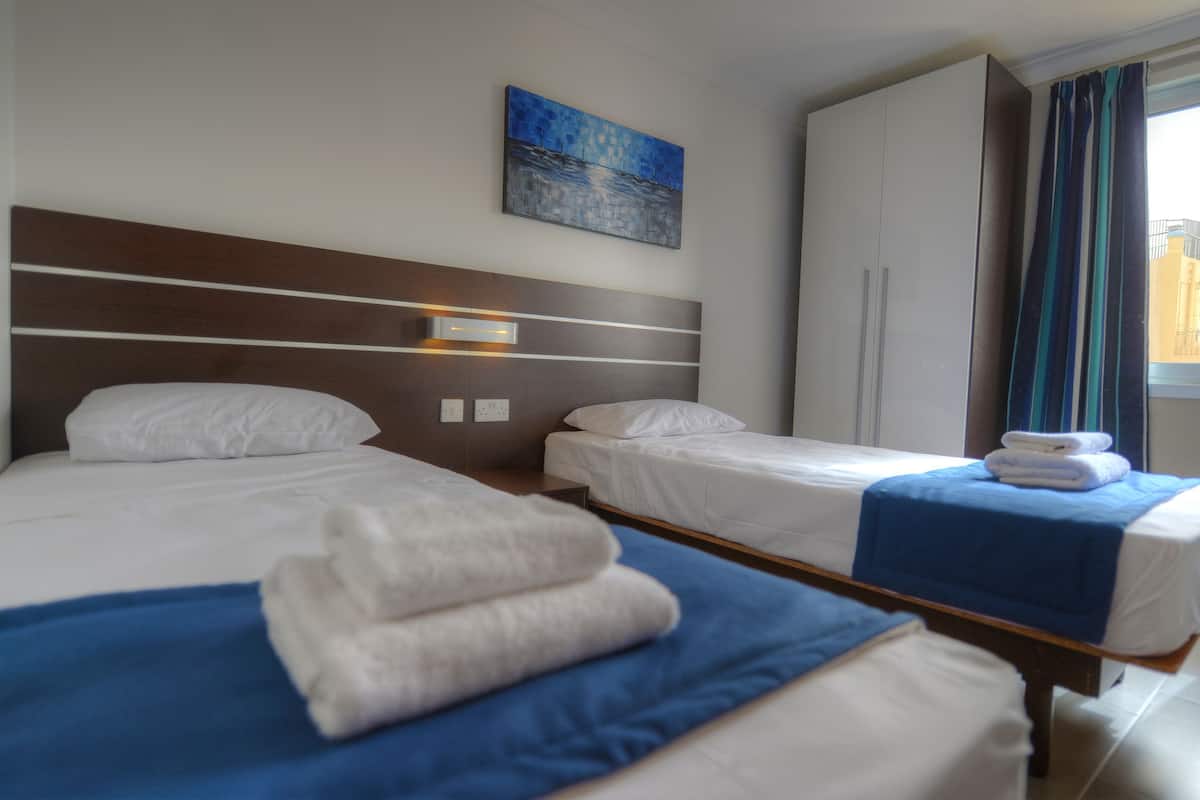 In-room safe, desk, laptop workspace, blackout curtains
