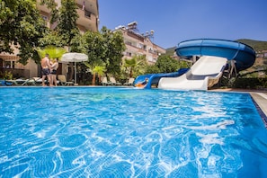 2 outdoor pools, pool umbrellas, pool loungers