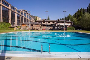 Seasonal outdoor pool, pool umbrellas, pool loungers