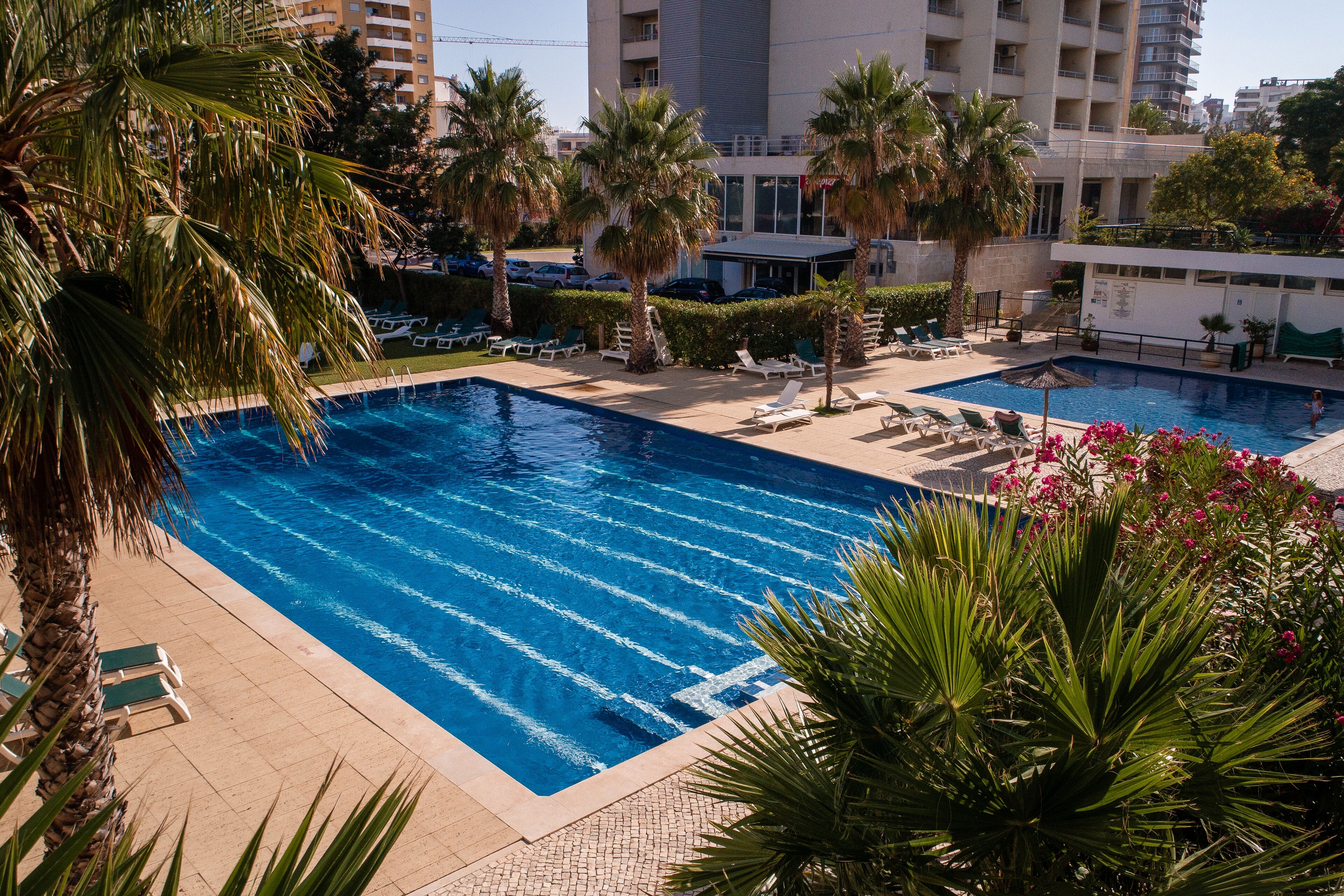 2 outdoor pools, open 9:00 AM to 8:00 PM, pool umbrellas, sun loungers