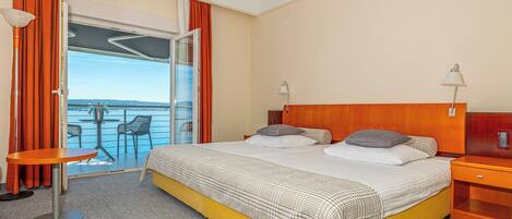 Twin Room, Balcony, Sea View | 1 bedroom, in-room safe, desk, blackout drapes