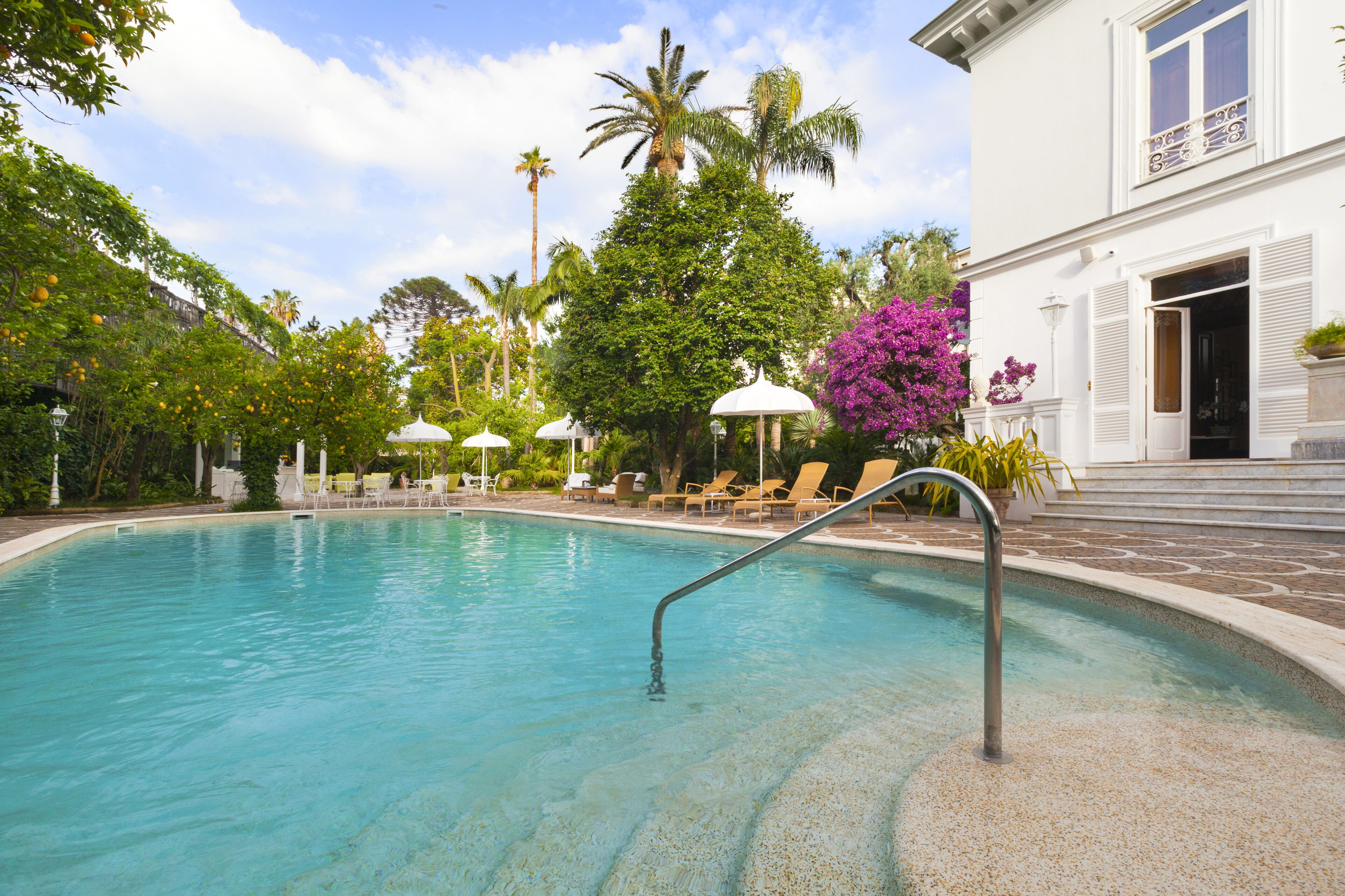 Outdoor pool, pool umbrellas, pool loungers