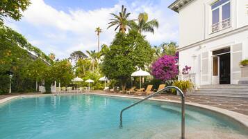 Outdoor pool, pool umbrellas, pool loungers
