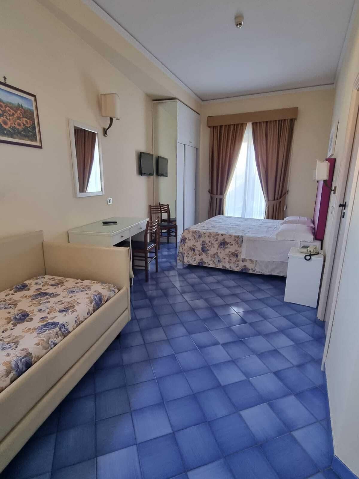 family room | in-room safe, desk, iron/ironing board, free wifi