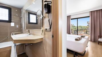Bathtub, free toiletries, hair dryer, towels