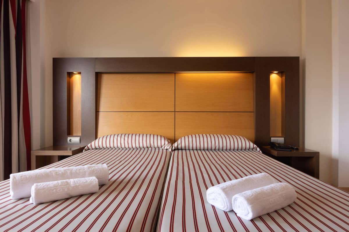 Blackout curtains, free WiFi, bed sheets