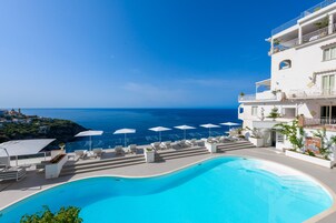 2 outdoor pools, open 7:30 AM to 7:00 PM, pool umbrellas, sun loungers