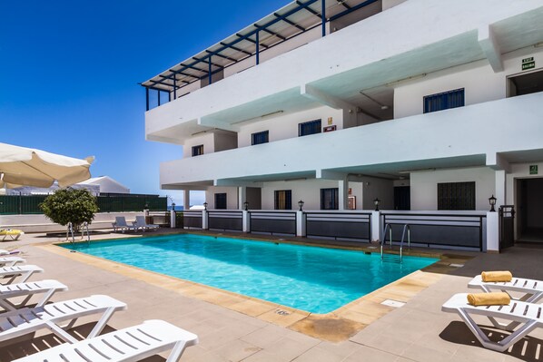 Outdoor pool, sun loungers