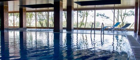 Indoor pool, open 10:00 AM to 8:00 PM, sun loungers