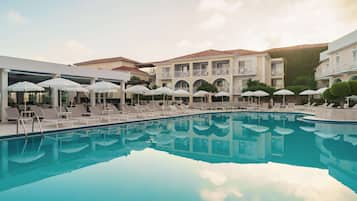 2 outdoor pools, open 9:00 AM to 6:00 PM, pool umbrellas, pool loungers
