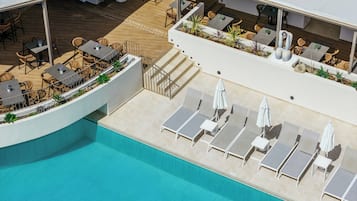 2 outdoor pools, open 9:00 AM to 6:00 PM, pool umbrellas, sun loungers