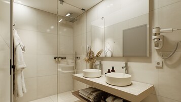 Camera Deluxe con letto matrimoniale o 2 letti singoli | Bagno | Set di cortesia gratuito, asciugacapelli, asciugamani, sapone
