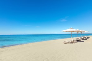 Private beach, sun loungers, beach umbrellas, beach towels