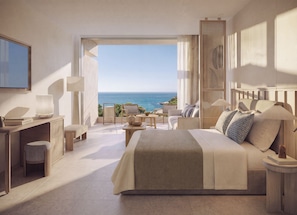 A modern bedroom with a large bed, a desk, and a view of the sea. - Ikos Oceania - All Inclusive (Nea Propontida)