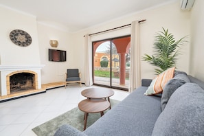 Two Bedroom Apartment | Living area | TV, fireplace - Colina Village (Lagoa)