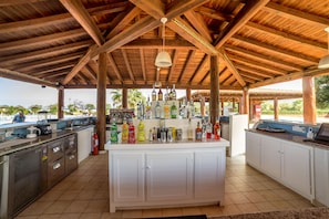 2 bars/lounges, poolside bar, beach bar