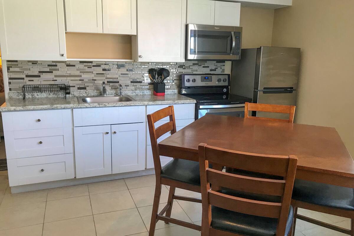 comfort apartment, 1 king bed with sofa bed, non smoking | private kitchen | fridge, microwave, coffee/tea maker, cookware/dishes/utensils