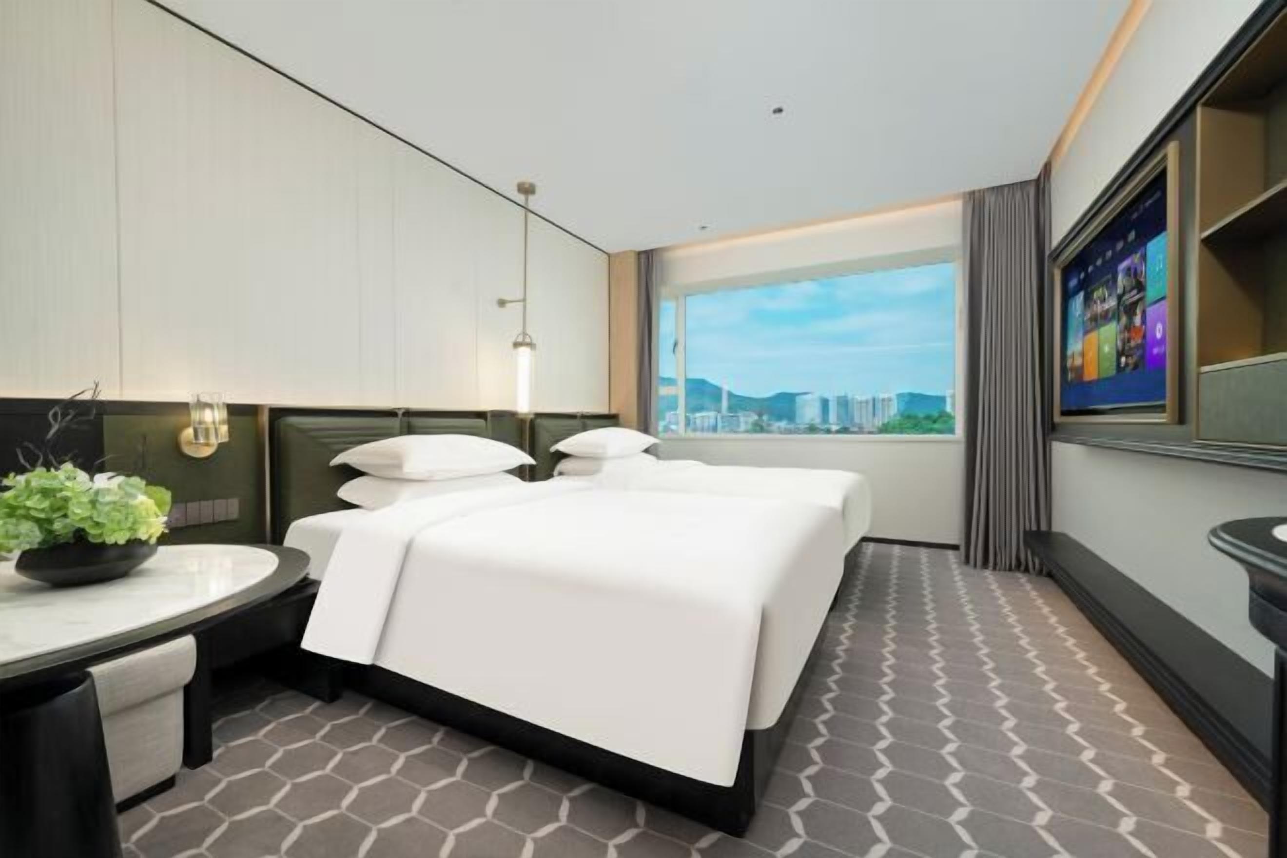 Ropa de cama de alta calidad, camas Select Comfort y minibar 