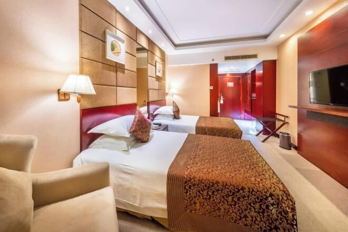Biancheria da letto di alta qualità, materassi Select Comfort, minibar