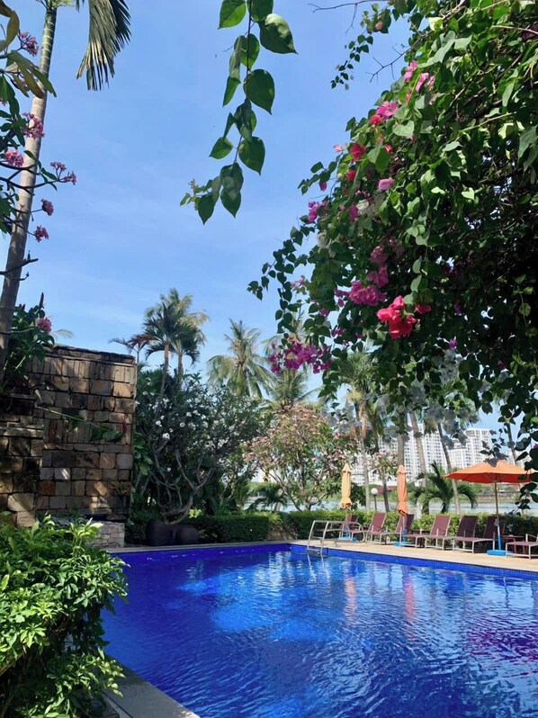 Outdoor pool, pool umbrellas, pool loungers