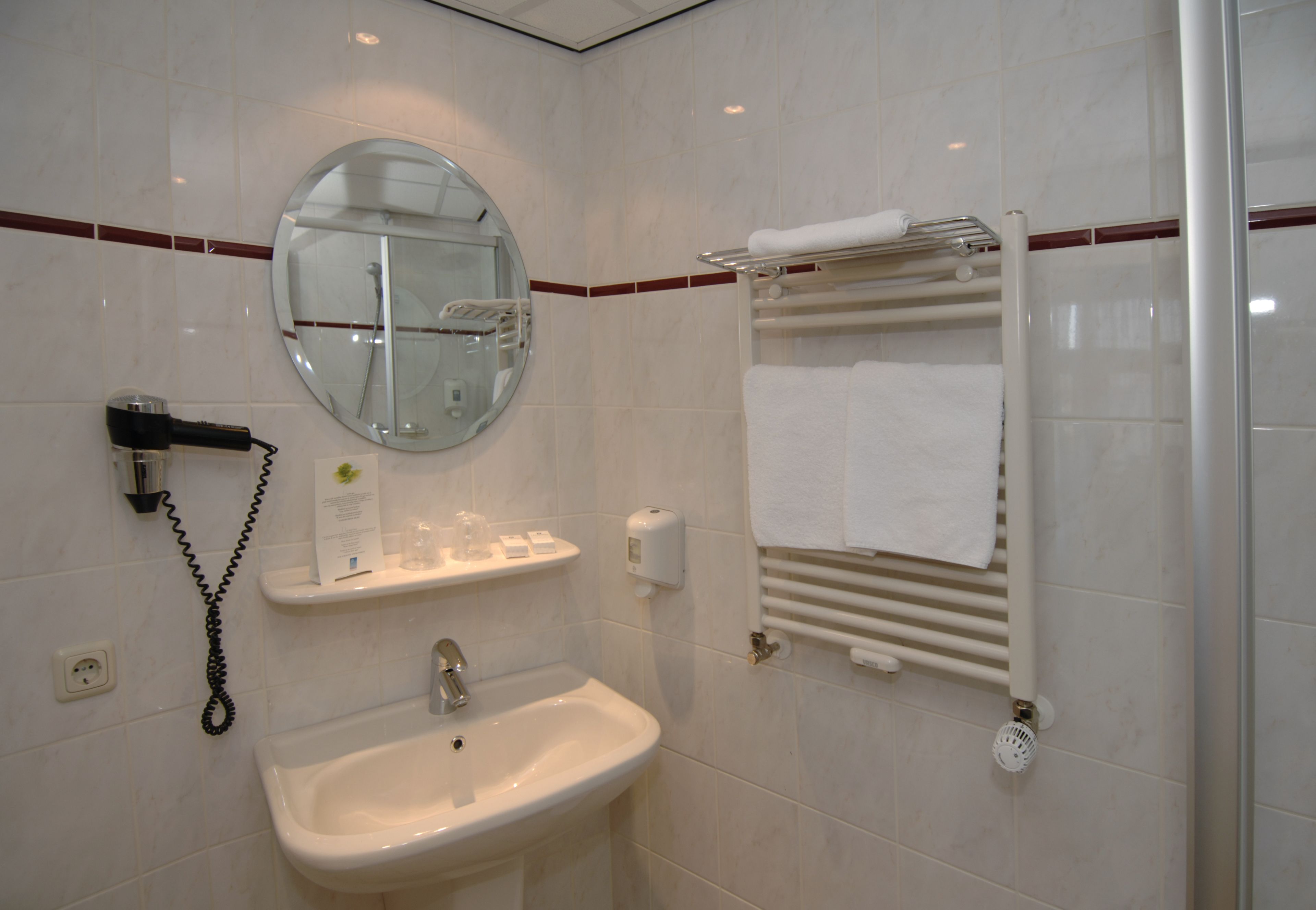 rainfall showerhead, free toiletries, hair dryer, bathrobes