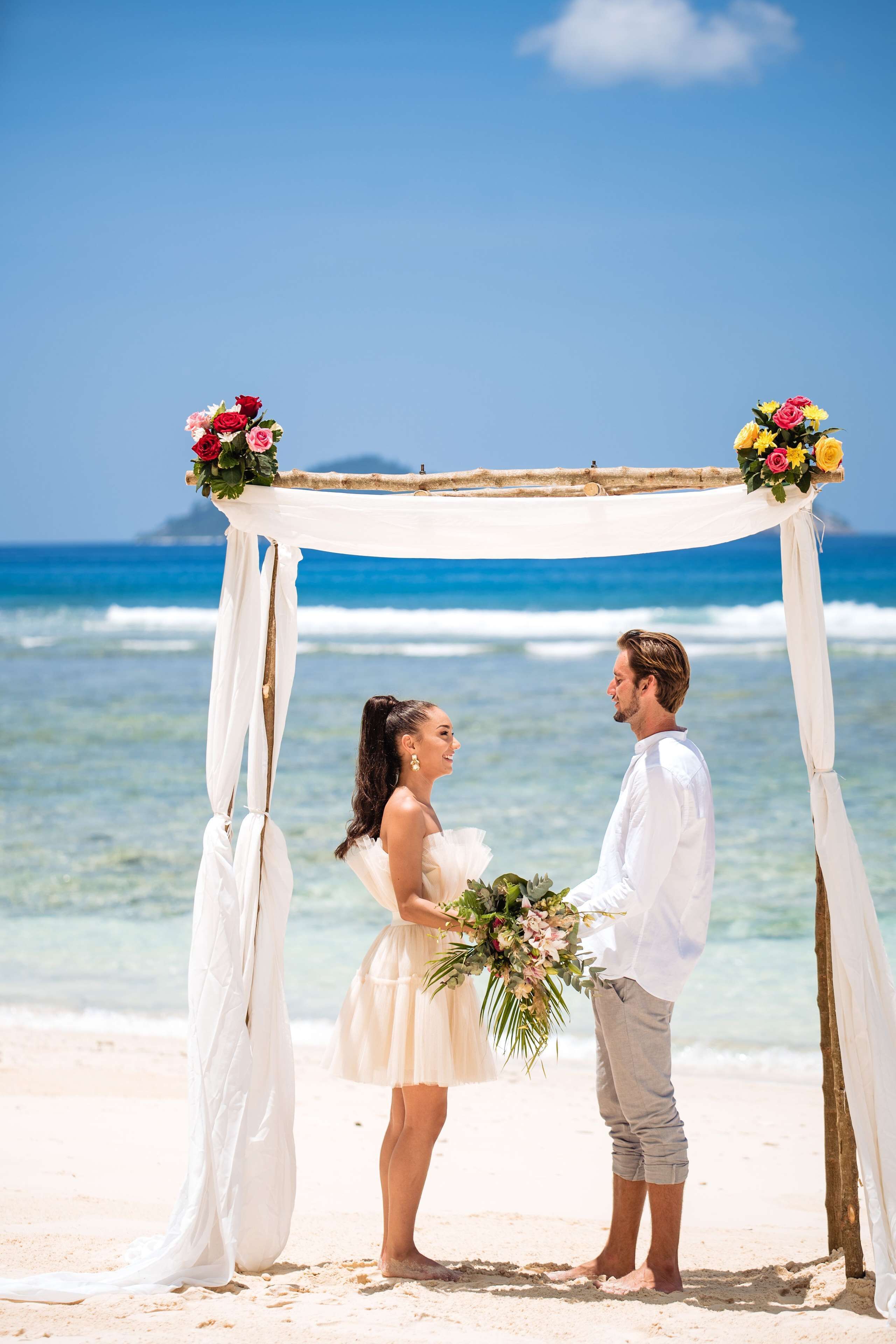 White sand, sun-loungers, beach umbrellas, beach towels
