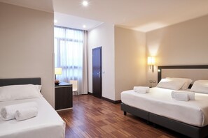 Deluxe Double or Twin Room | Minibar, in-room safe, desk, laptop workspace