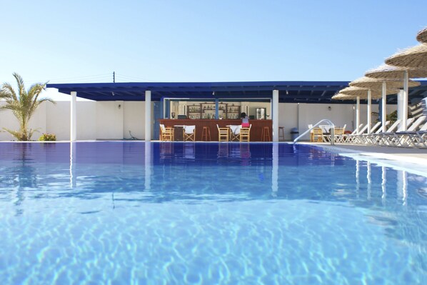 Outdoor pool, pool umbrellas, pool loungers