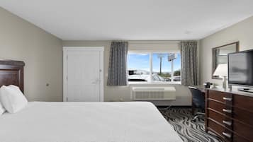 Escritorio, cortinas blackout, wifi gratis y ropa de cama