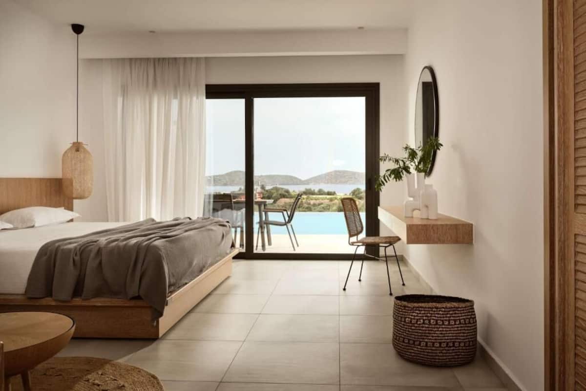 family suite, 2 bedrooms, private pool | in-room safe, desk, laptop workspace, soundproofing