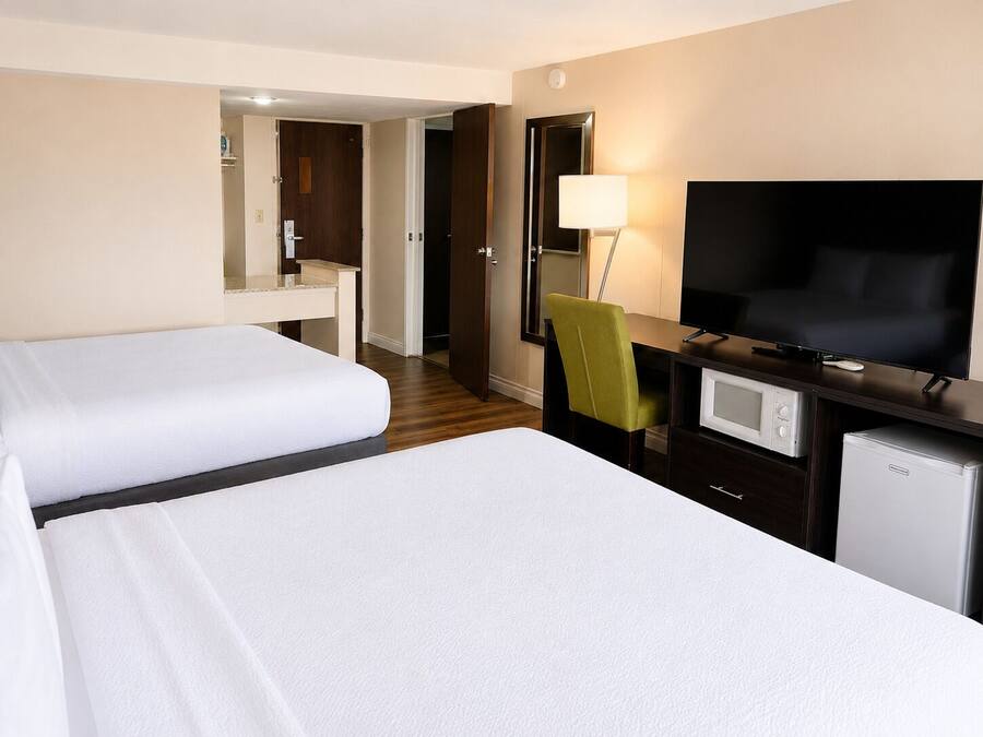 Premium bedding, down comforters, pillowtop beds, desk