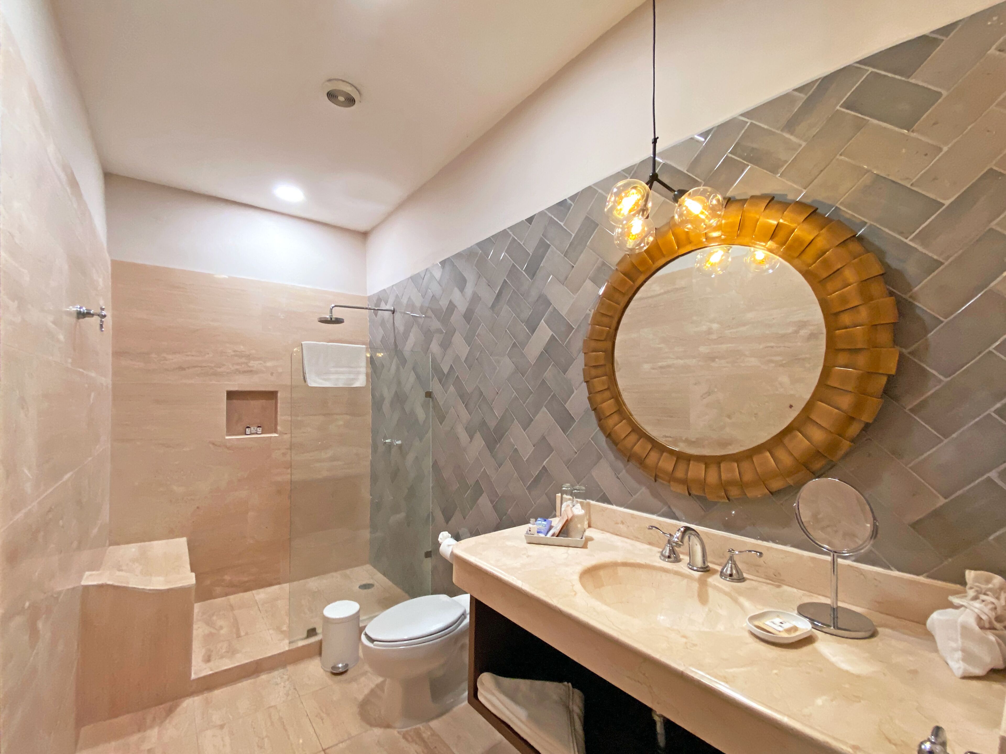 luxury room, 2 queen beds, pool view | bathroom | hair dryer, towels, soap, shampoo