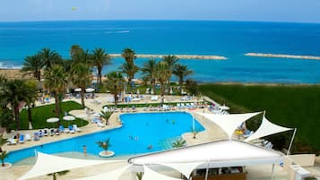 Indoor pool, outdoor pool, open 10:00 AM to 6:00 PM, pool umbrellas