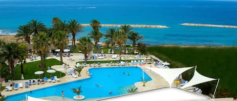 Indoor pool, outdoor pool, open 10:00 AM to 6:00 PM, pool umbrellas