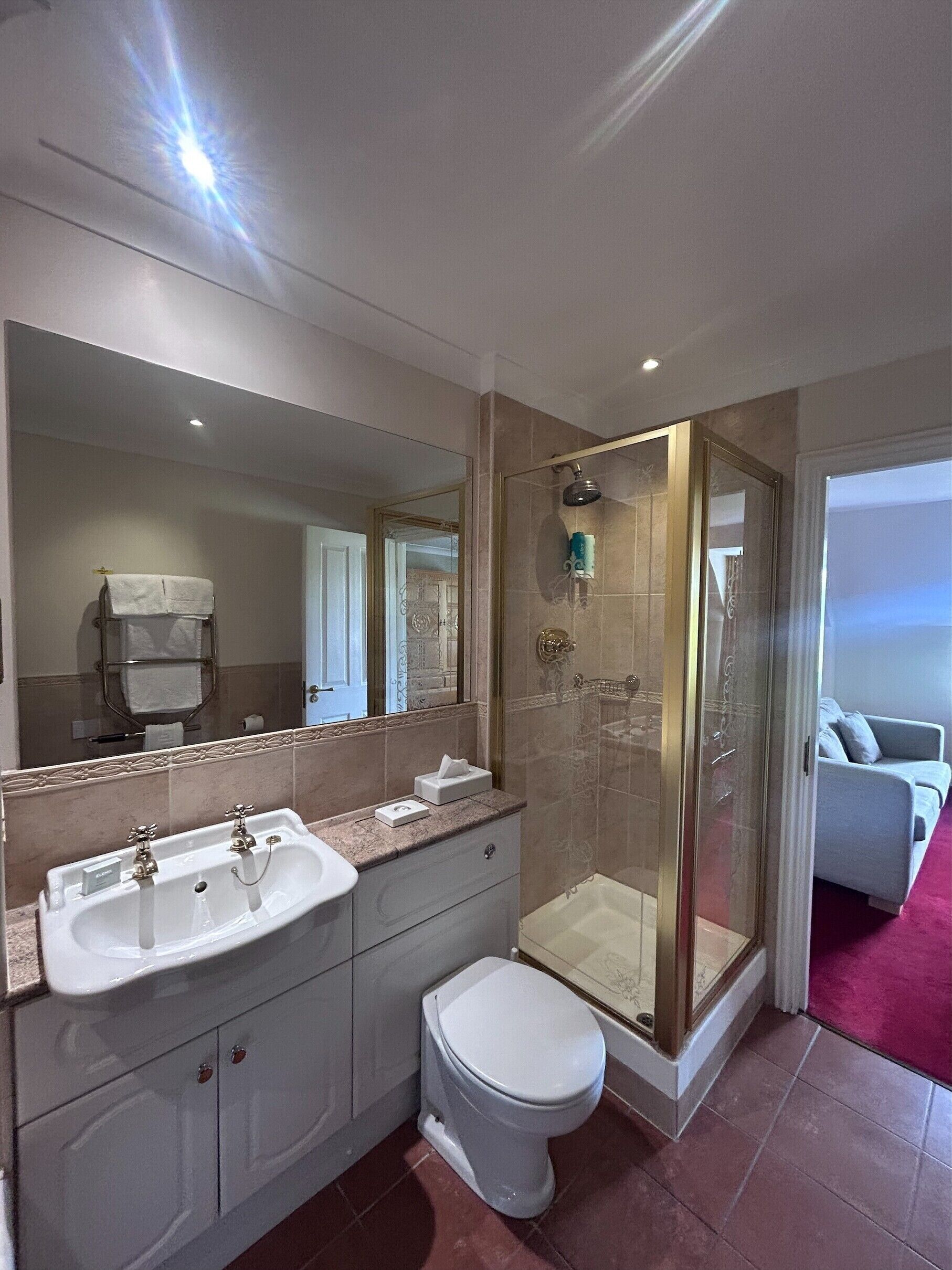 superior suite | bathroom | free toiletries, hair dryer, towels, toilet paper
