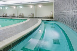 Indoor pool, open 6:00 AM to 10:00 PM, pool loungers