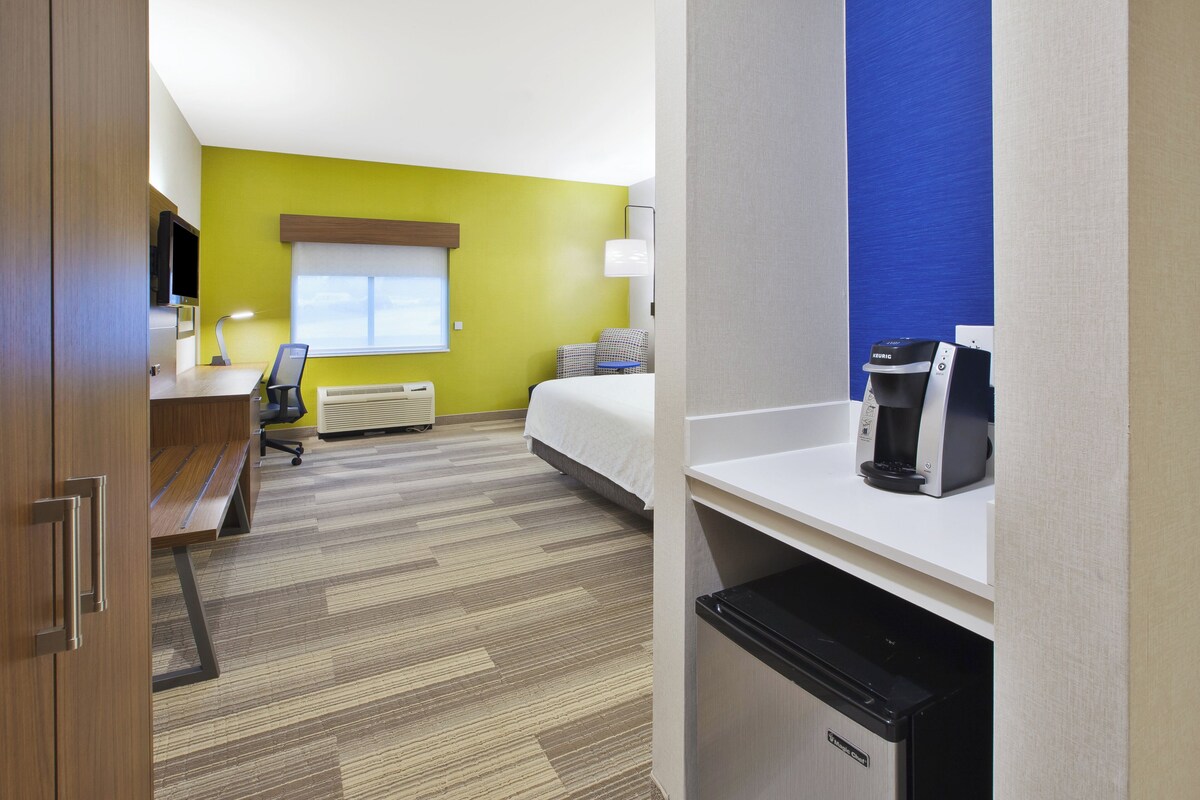 Down comforters, pillowtop beds, in-room safe, desk