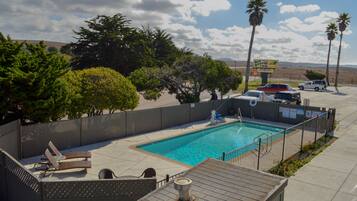 Seasonal outdoor pool, open 9 AM to 9 PM, pool loungers