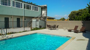 Seasonal outdoor pool, open 9 AM to 9 PM, sun loungers