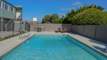 Seasonal outdoor pool, open 9 AM to 9 PM, pool loungers