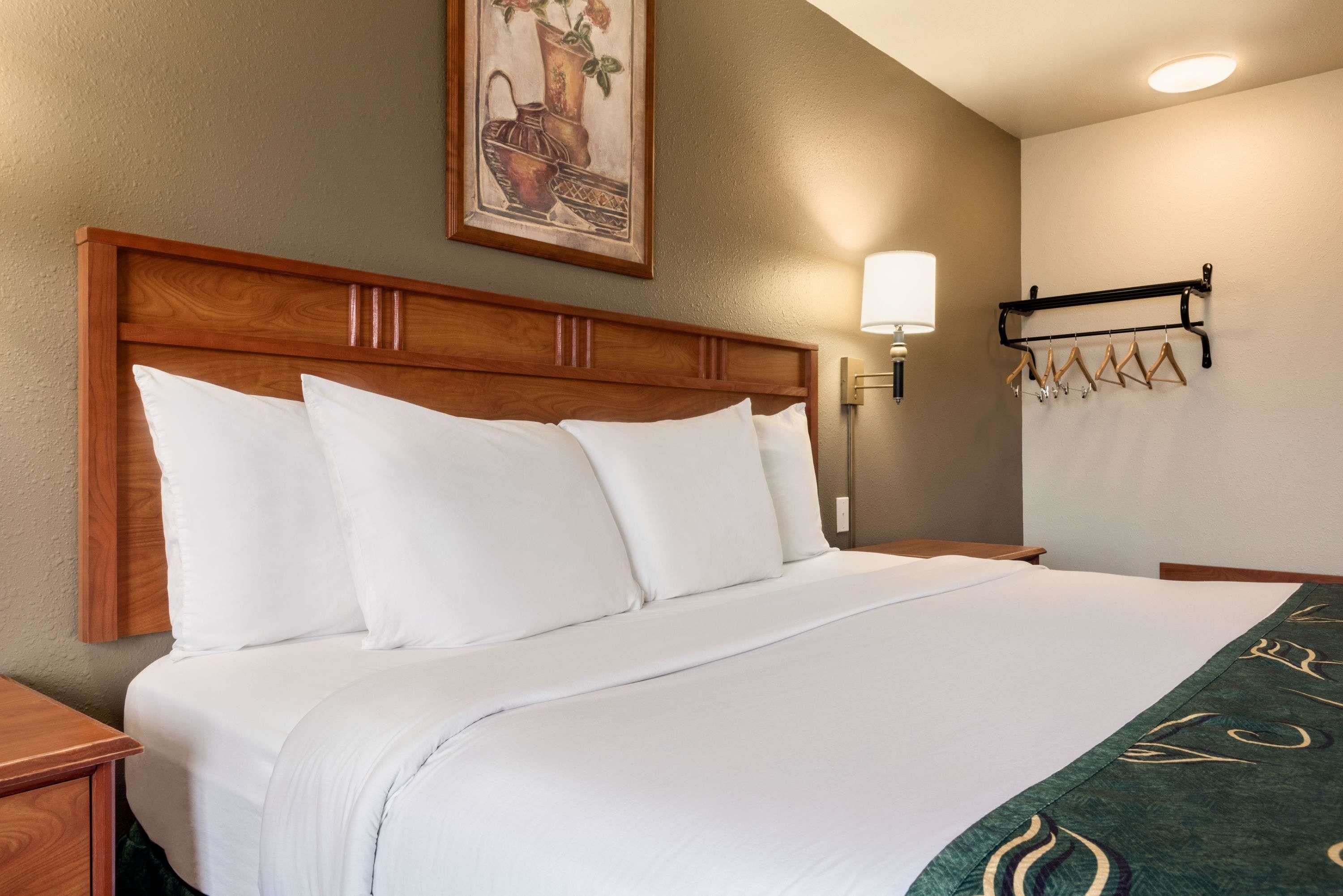 desk, blackout curtains, iron/ironing board, free cots/infant beds