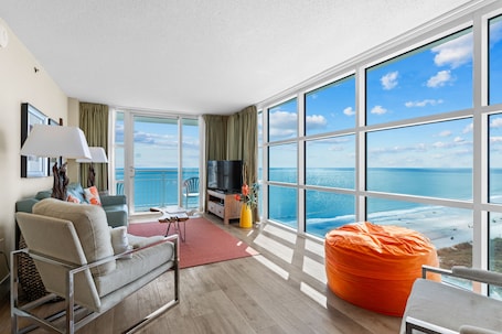 Standard Condo, 3 Bedrooms, Oceanfront | Living area | Flat-screen TV, DVD player. Seaside Resort