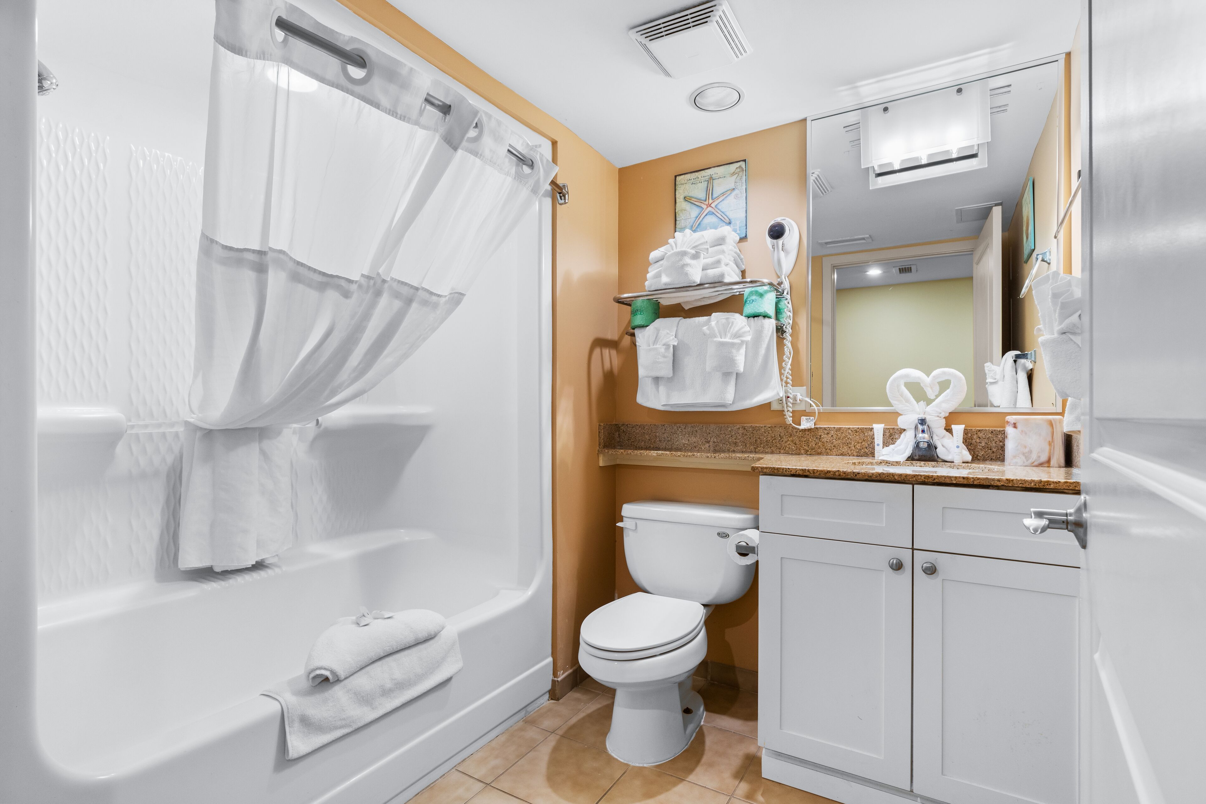 combined shower/bathtub, free toiletries, hair dryer, towels