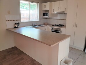 Mini-fridge, microwave, coffee/tea maker, electric kettle